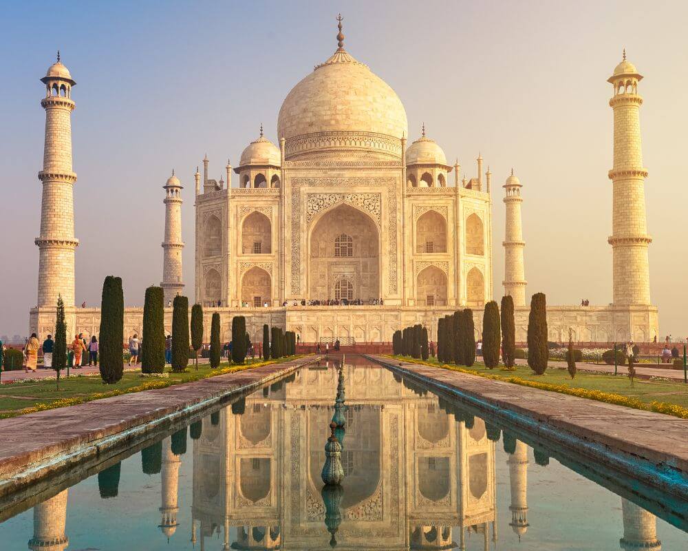 View of the Taj Mahal sunrise with reflections - India eSim
