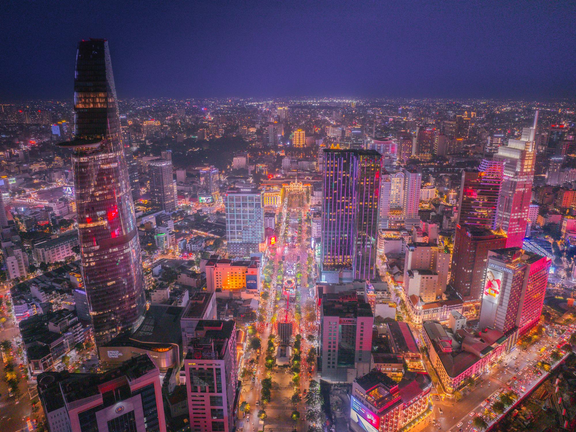 View of the Aerial view of night cityscape in central of Ho Chi Minh city - Vietnam eSim
